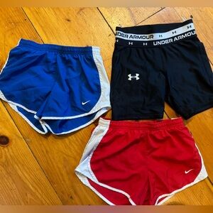 3 pairs of girls athletic shorts, Nike and under Armour ￼